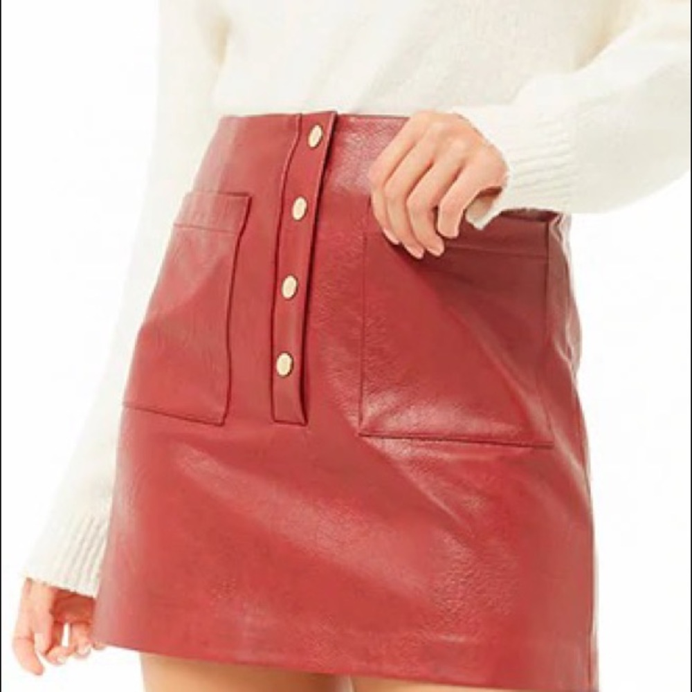 Red leather skirt. Never worn. Everything in tact